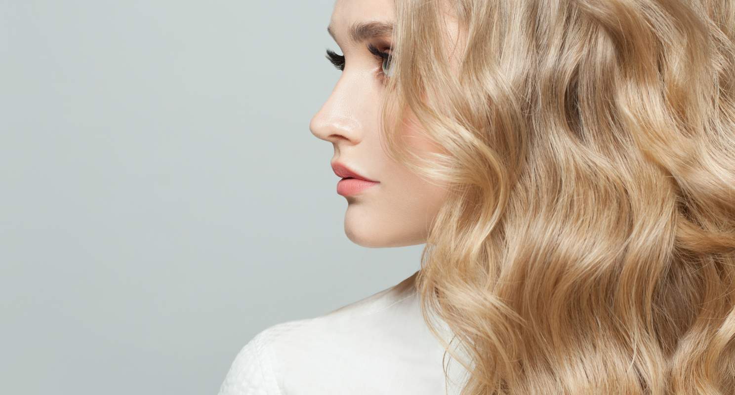 1. Soft Golden Swells With Face- Framing Layers