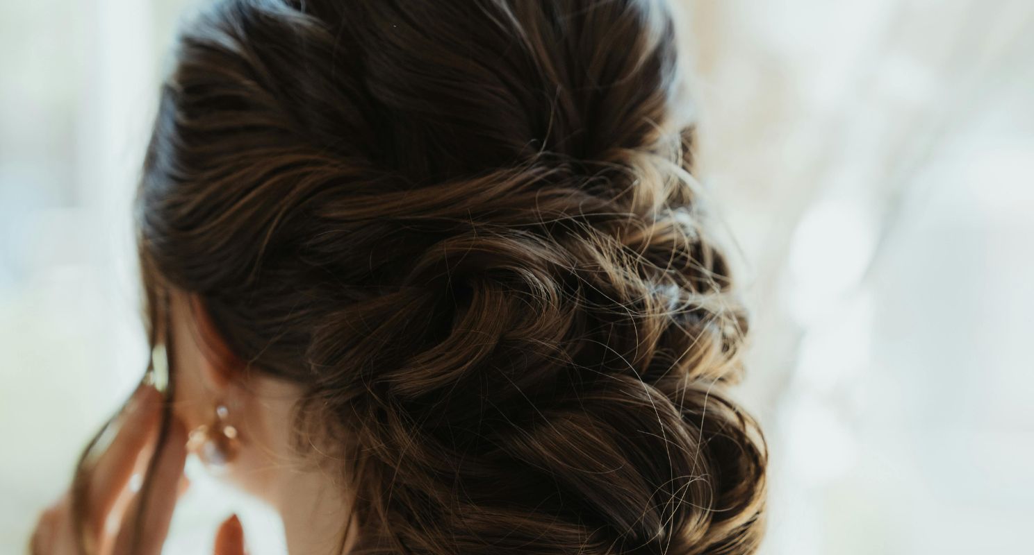 Textured Low Bun With Soft Loose Strands