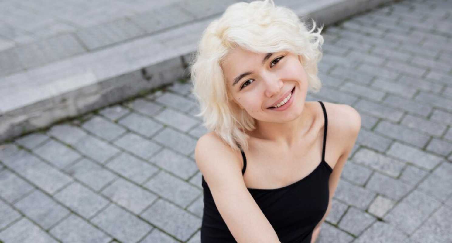 12. Platinum Blonde Fluffy Bouncy Bob Cut With Face Layers