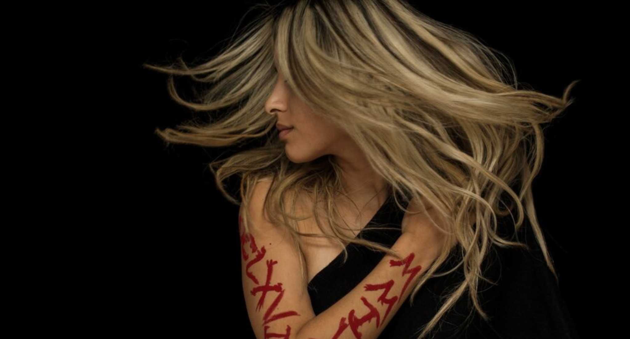 29. Blonde Wolf Cut with Feathered Layers