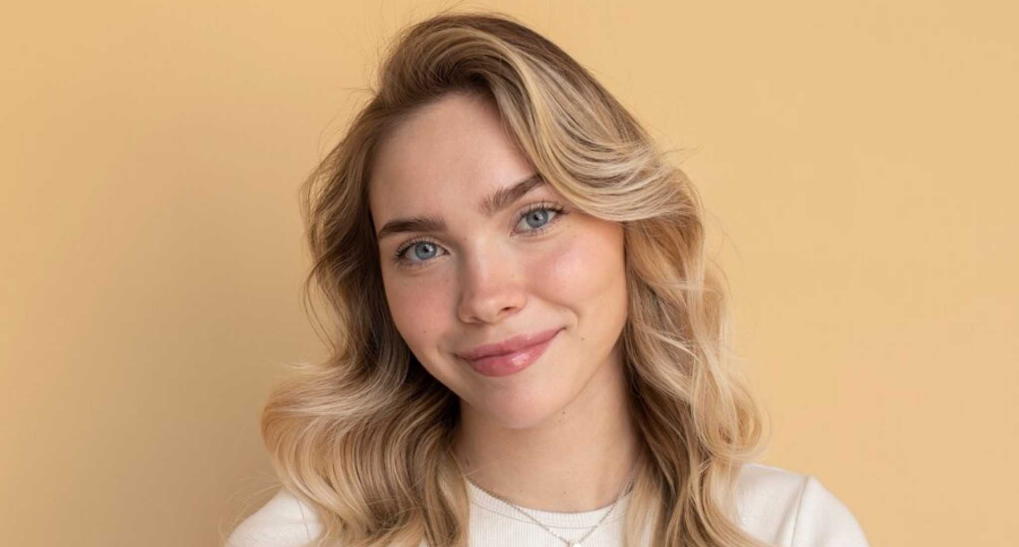 8. Blonde Wolf Cut with Face-Framing Highlights