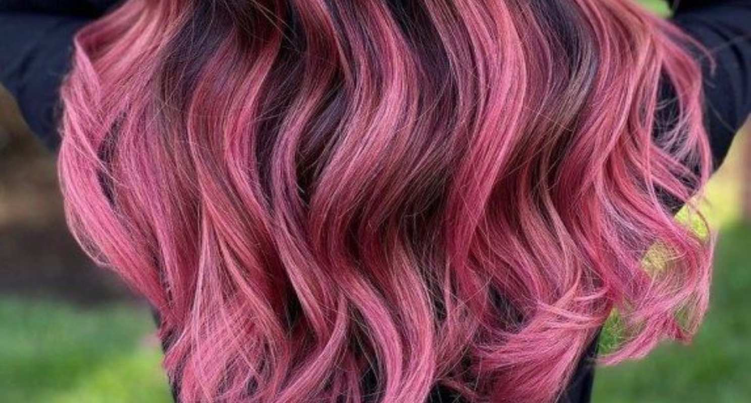 Black Hair With Beachy Waves and Pink Balayage