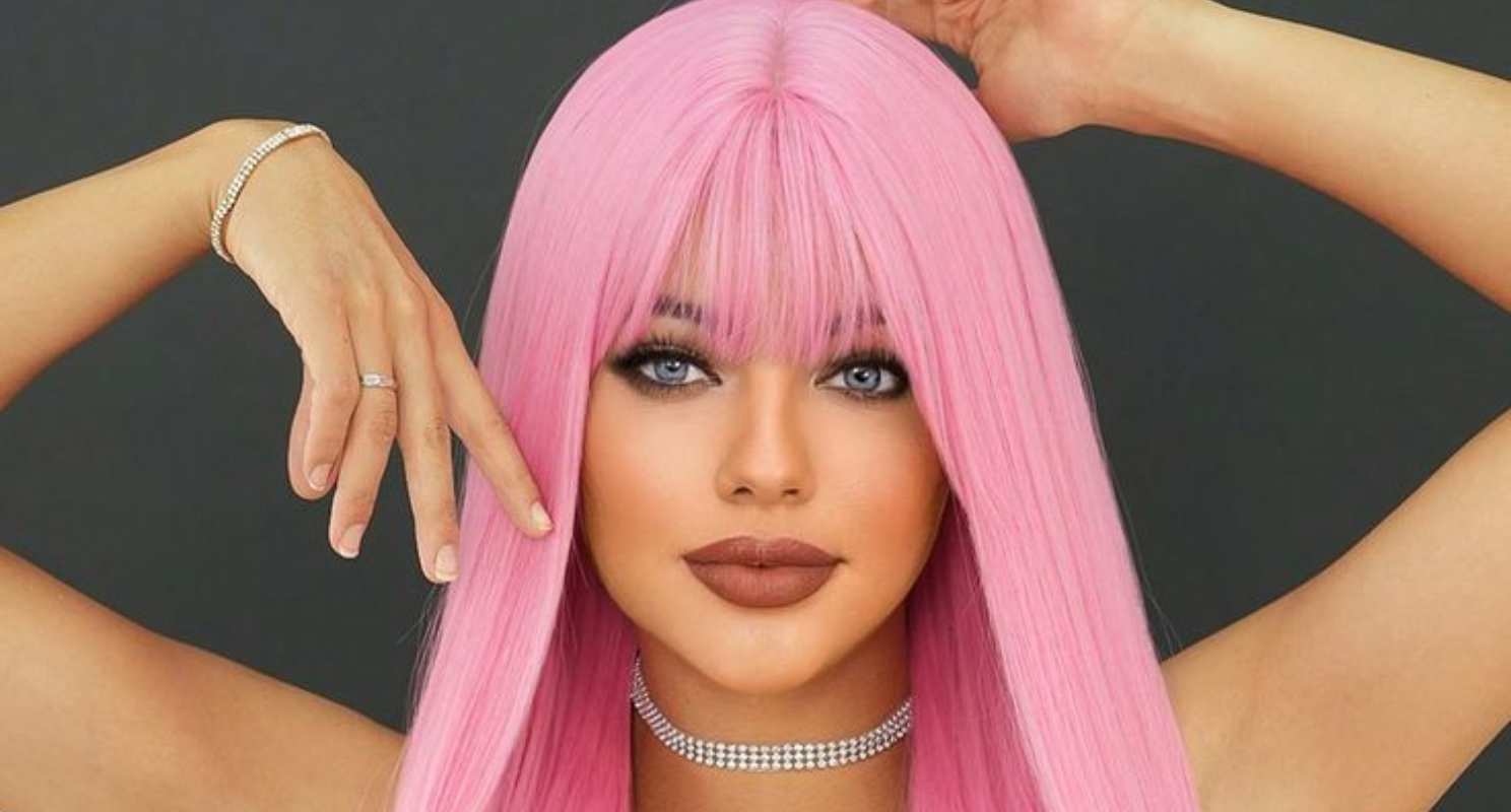 Long Coral Pink Straight Hair With Blunt Bangs