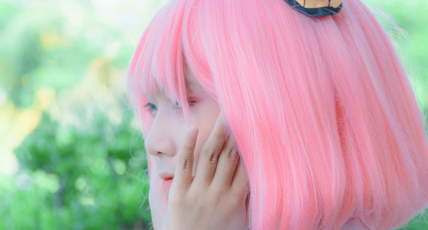 Pink Long Bob With Side-Swept Hair